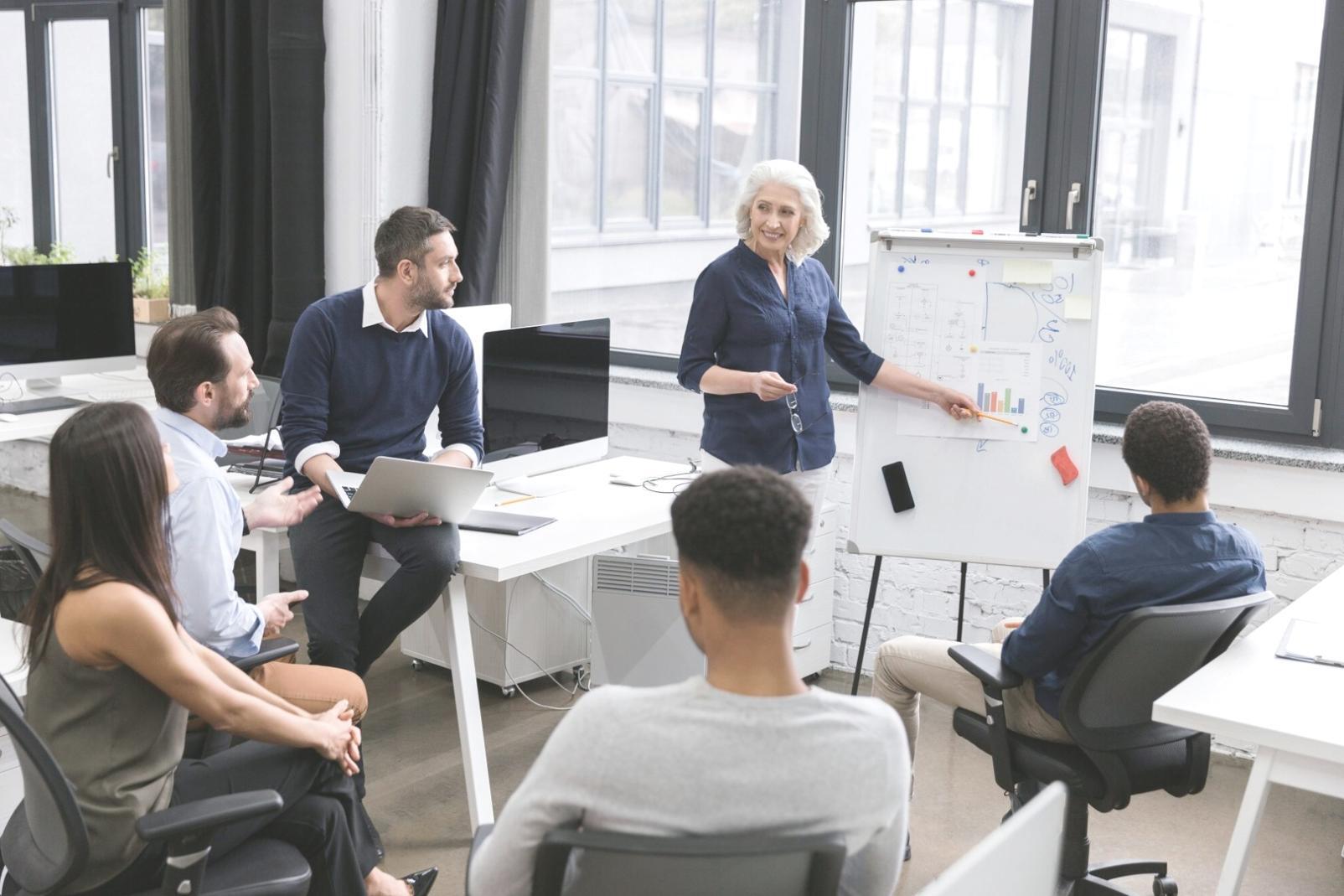 Executive reviewing comprehensive financial reports and business analytics